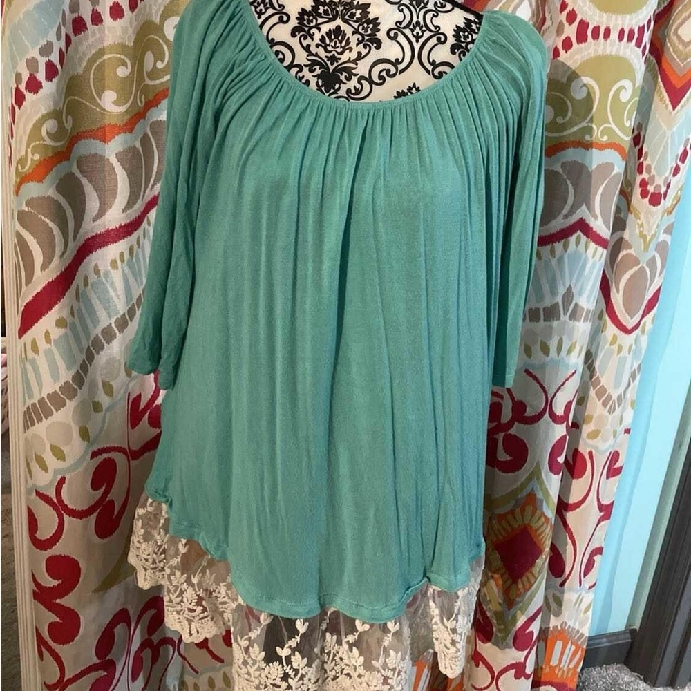 3/4 sleeves tunic with ruffle hem